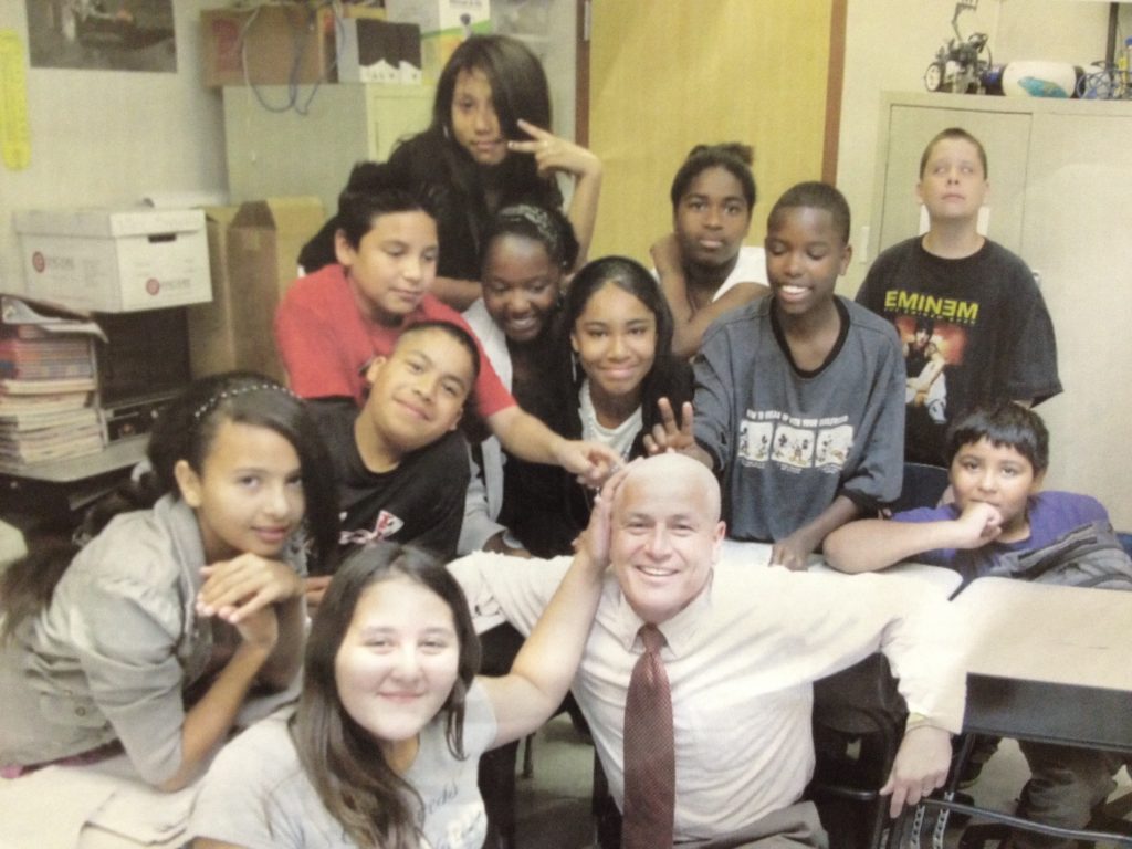 Senator Jerry Lewis with students of Children First Academy.